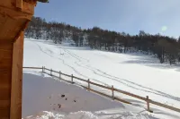 Chalet with nice view, garden and hot tub. Ideal for skiing and cycling!