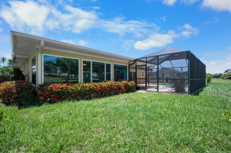 Near beaches! 2100 square foot heated pool home on the Golf Course!