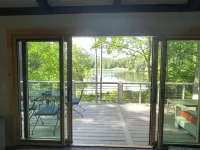 Breathtaking lake views, steps from beach, golf, and clubhouse. Renovated home!