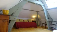 At the foot of the Abbey in the heart of a small village and 9 km from Rouen