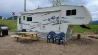 Camper at Minigolf Course COUGAR