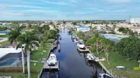 Escape and get tropical at Belle's Tropic Spot...YACHT Club Beach neighborhood!