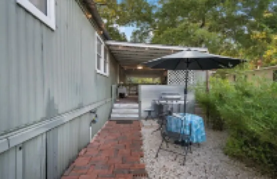 Hot Tub, Fire Pit, Cabana, Covered Patio & Pet-Friendly Riverside Retreat