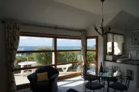 Warmth and comfortable house with a 180° view of the sea in Plouhinec.