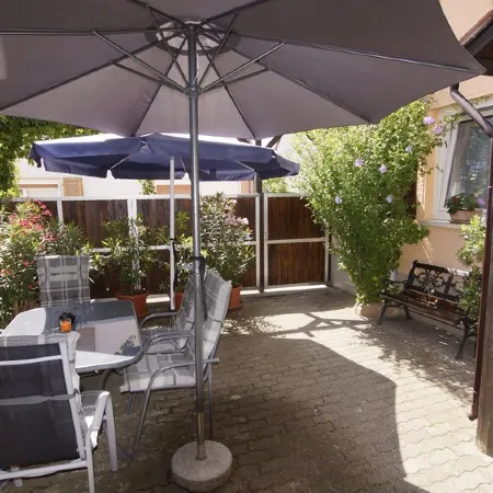 Vacation Apartment for up to 6 People with Sunny Courtyard, Garden and Pool