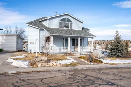 Unique Triangle Shaped Home with 2 Master Suites on Separate Floors.
