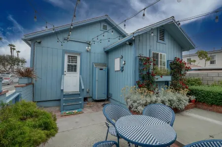 Across quiet street from sandy beach.