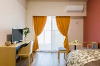 Mr.Kinjo Inn in Front of Children Medical Care Center فنادق في يونابارو