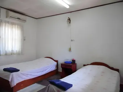 Heuan Lao Guesthouse Отели рядом с достопримечательностью «Ват Симыанг»