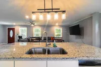 Spacious 4 BR 3 Full Bath House Near Airport & Shopping!