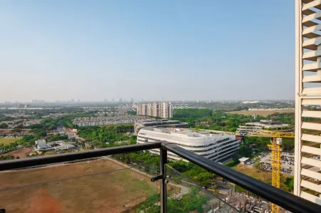 Nala by TwoSpaces 2Br at Skyhouse Apartment Отели в г. Cisauk