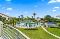 Pool View Balcony and Tropical Landscaping - Beautiful Coastal Escape