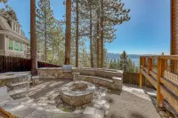 Two-story lakeview villa with two kitchens, patio, firepit, & multi-level deck
