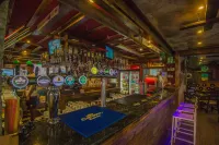 Windmills Hotel Apartments - bar