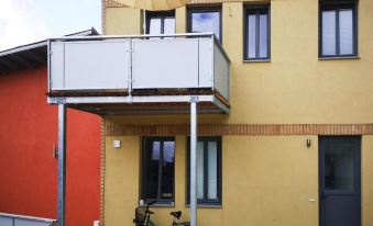 Terraced House in Malchow by Monkey Forest