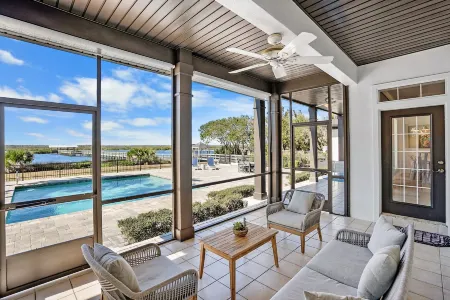 Waterfront Home w Patio Heated Pool Dock Beach