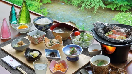 KANOUYASHIMAONSEN Отели рядом с достопримечательностью «Lake Okushima»