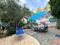 Apartment Didi with private garden, close to the center, family-friendly