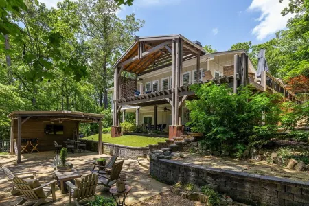 Lake Allatoona house with private dock, hot tub & fire pit. Family and groups!