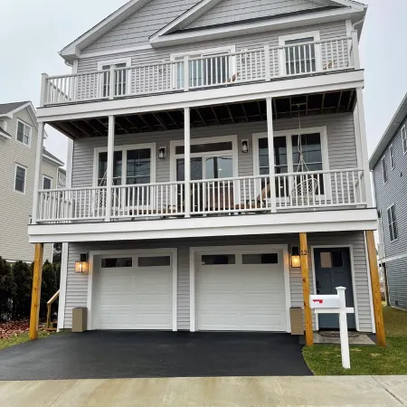 Brand new house with water views just steps from beach!