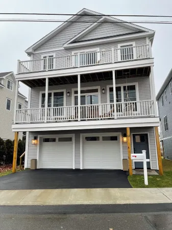 Brand new house with water views just steps from beach!