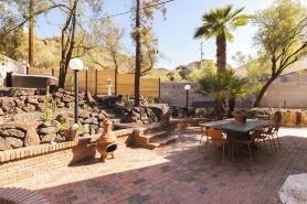 Perched Mountain Home with a Hot Tub + City Views