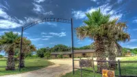 6-bedroom Lodge on 12 acres in Concan, Texas.  Swimming pool & hot tub.
