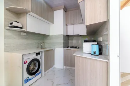 charming 2-room apartment offers the perfect retreat for families and friends. Отели в г. Rasdhoo