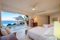 Stunning contemporary oceanfront villa with sandy beach, full staff sleeps 14 Hotels in 