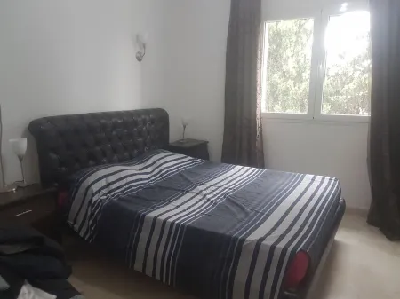 Etage de Villa Calme à 5 mn de la Zone Touristique Отели в г. Гаммарт