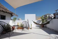 Charming rooftop bungalow 1 block from the beach! Hotels near Koko Boutique