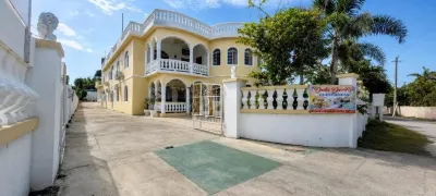 บ้านพักเดลา เด-โรส ณ เนกริล จาเมกา โรงแรมใน