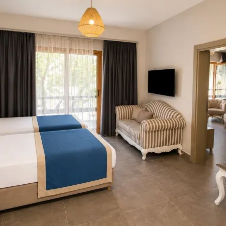 Mercans Bodrum Beach Hotel Отели рядом с достопримечательностью «Пляж Гундоган»