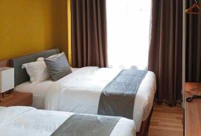 Chill Twin Room Sans Hotel at The Luxebridge Suites Davao Photo