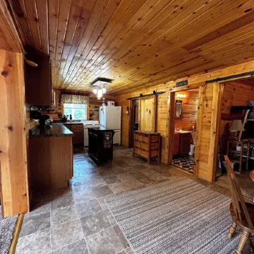 Cute Cabin on Big Pine Lake with a Large Fenced Yard and Lake Access