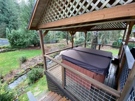 Feel at home in the mountains by a creek w/hot-tub