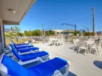 Walk to the beach, boardwalk and shopping! Pool on site, great location!