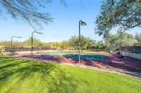 NEW! Cozy desert getaway with private backyard and seasonal pool!