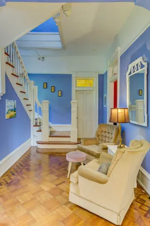 Victorian home with four bedrooms and four and one half bathrooms.