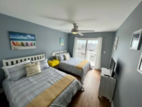 Steps to the Boardwalk and Beach! Perfect for a Family Vacation.