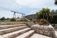 Secluded old farmhouse with a view and pool to relax in total quiet.