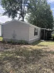 Slice of Heaven 3/2 camp on lakefront w/ boathouse