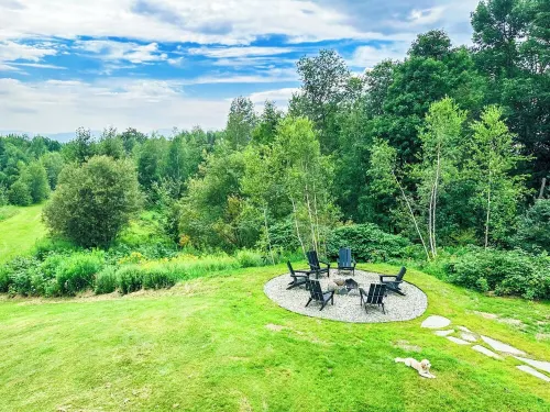 Modern barn perched on 24 acres w/ stunning views of mountains & ski resort