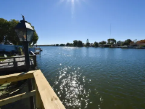 GREAT LOCATION WATERFRONT, HEATED POOL! BEAUTIFUL SUNSETS, ALL PETS STAY FREE! Hotels in Holiday