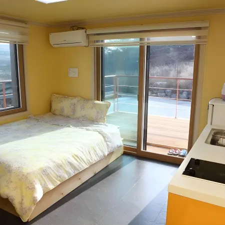Healing Village Pension Отели рядом с достопримечательностью «Парк аттракционов Gyeongju World»