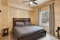 Green & Black Bear Cabins by Beyond Expectations