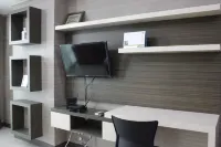 Prime and Comfy Studio at Tamansari la Grande Apartment by Travelio