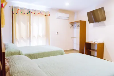 Santa Martha Bungalows Hotels near Mandarina