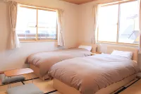 Guesthouse Kanoka Hôtels à proximité de la JR Kamiimai station