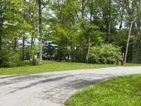 Sunny cottage built over the water on the St. Lawrence River